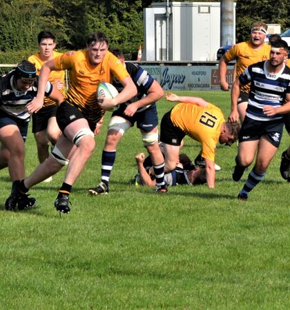 Cian McCann has eyes only for the Corinthians line as he powers forward on his way to scoring Buccaneers third try