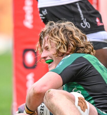Cian Prendergast celebrates after scoring a try 23/4/2022