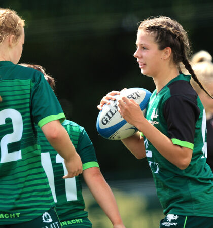 Molly Boote celebrates scoring a try 7/8/2022